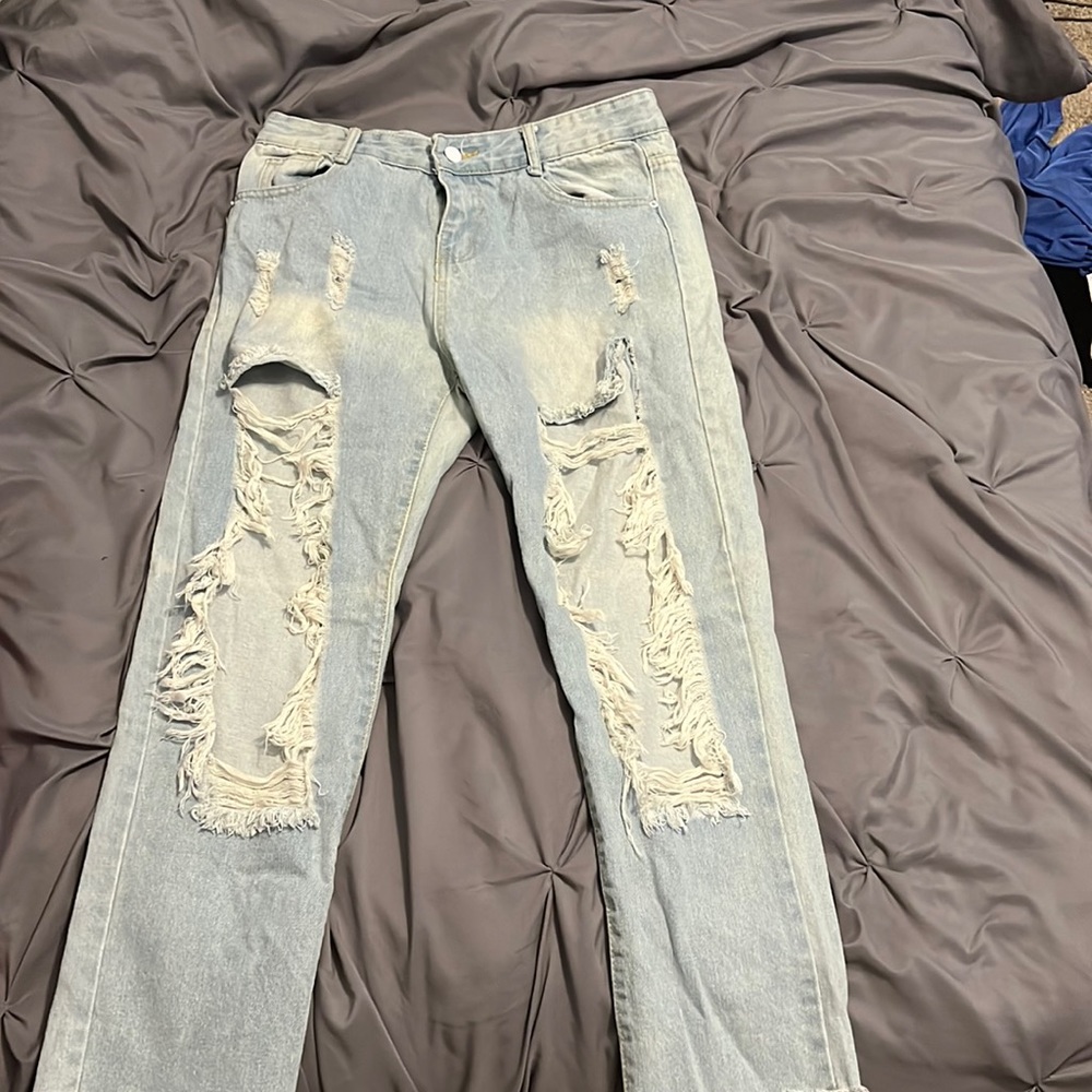 super ripped light blue jeans